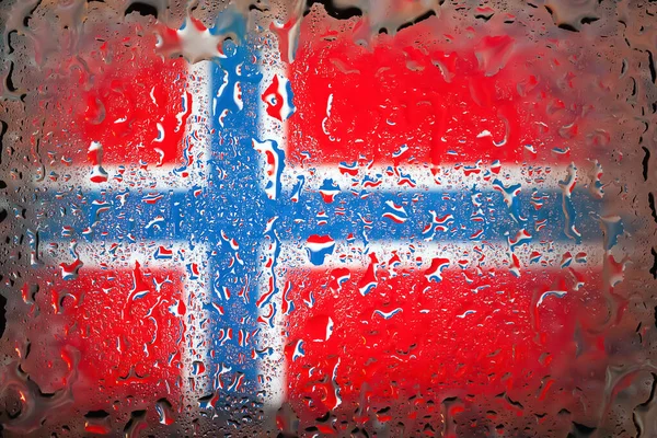 Norway flag. Norway flag on the background of water drops. Flag with raindrops. Splashes on glass. Abstract background