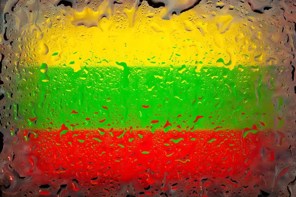 Lithuania flag. Lithuania flag on the background of water drops. Flag with raindrops. Splashes on glass. Abstract background