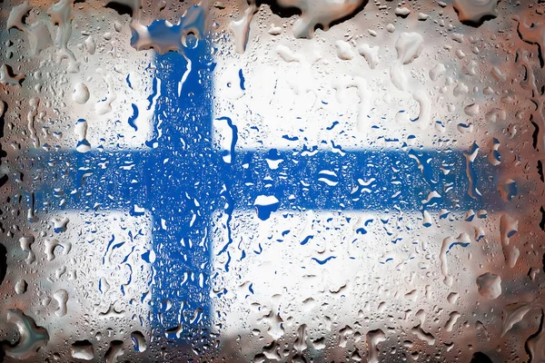 Finland flag. Finland flag on the background of water drops. Flag with raindrops. Splashes on glass. Abstract background