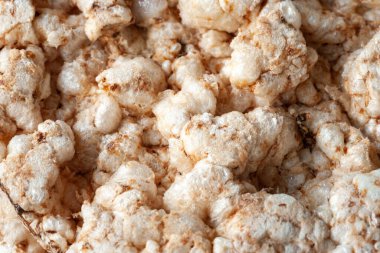 Kızarmış ekmek dokusu. Pirinç gevreği yakın plan. Sağlıklı yiyecekler. Yukarıdan bak. Seçici odak