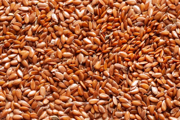 Flax seeds. Flax seeds close up. Seed texture. Omega 3. Healthy food. Top view