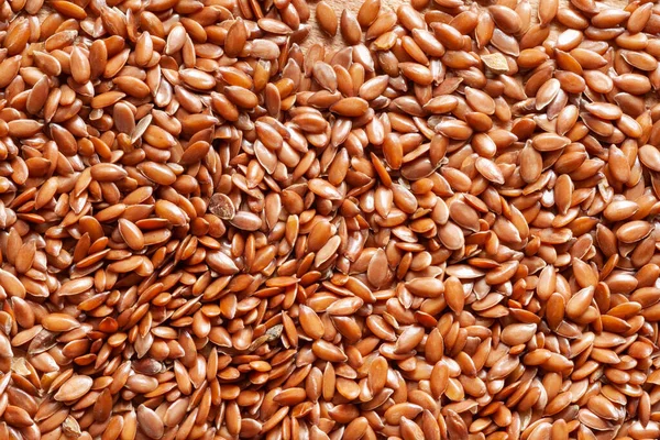 Flax seeds. Flax seeds close up. Seed texture. Omega 3. Healthy nutrition. Top view