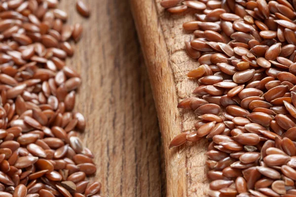 Flax seeds. Flax seeds on a wooden board close-up. Omega 3. Healthy food. View from above