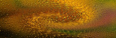 Su damlaları. Soyut spiral eğimli pankart. Damla dokusu. Sarı renkte. Ağır desenli görüntü. Yüzeyin derinliği. Seçici yumuşak odak