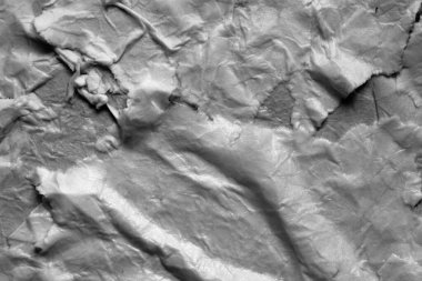 Islak yırtık kağıt dokusu. Buruşuk yüzey dokusu olan boş bir kağıt parçası. Kağıt arkaplan. Tam çerçeve