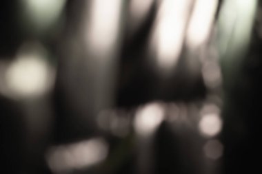 Parlak yüzey. Soyut arkaplan. Işık lekeleri. Odaklanamayan parıltı. Parlak yüzey. Bulanık resim