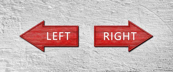 Red wooden arrow signs with the word LEFT and RIGHT hang on a plastered wall. Right and left arrow pointers. Set direction signs