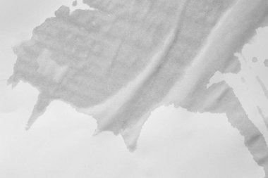 Islak kağıt. Beyaz kağıtta ıslak bir leke. Kağıt üzerinde su lekesi. Soyut doku