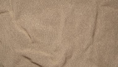 Kumaş dokusu. Pörsümüş pamuk. Soyut arkaplan. Örgü kumaş. Desenli resim