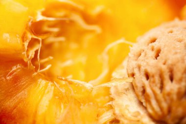 Şeftali deseni. Sulu olgun şeftali püresi. Seçici yumuşak odak