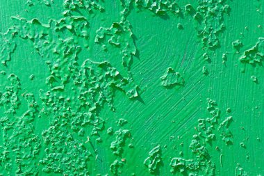 Boya dokusu soyuluyor. Eski yeşil boyayı soyuyordum. Soyut desenli arkaplan