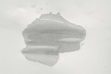 Kağıt üzerinde ıslak bir nokta. Boş ıslak kâğıt. Hasarlı kağıdın soyut dokusu