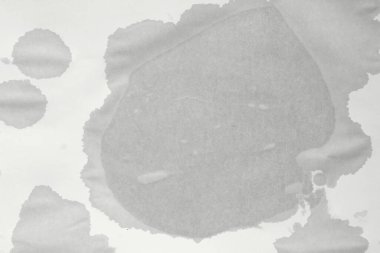 Kağıt üzerinde ıslak bir nokta. Boş ıslak kâğıt. Islak ofis kağıdı. Soyut doku