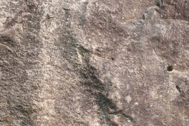 Taş dokusu. Taşa yakın çekim. Dağlarda büyük taşlar. Doğa arkaplanı