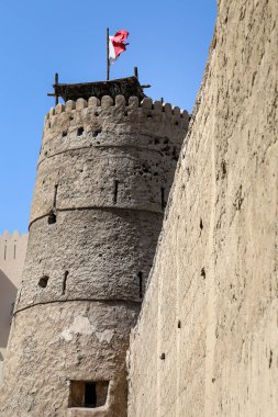 Dubai, UAE - February 14,2022: Al Fahidi Fort the oldest existing building in Dubai, its now the Dubai Museum. Its presenting the traditional way of life in the Emirates. Located on the Dubai Creek
