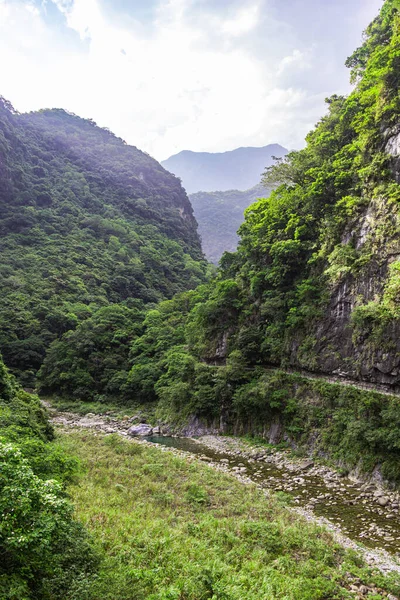 stock image Shakadang hiking trail at the Taroko National Park Taiwan. The protected mountain forest landscape named after the landmark Taroko Gorge, carved by the Liwu River. Taiwan natural wonders and heritage.