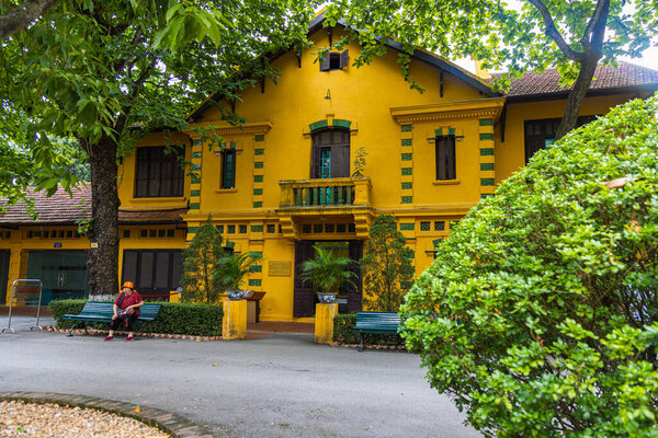 Hanoi, Vietnam - May 28, 2023: Historical Museum overlooking House No. 54 where President Ho Chi Minh lived in the Presidential Palace. Thousands of tourists visit Ho Chi Minh Village every day