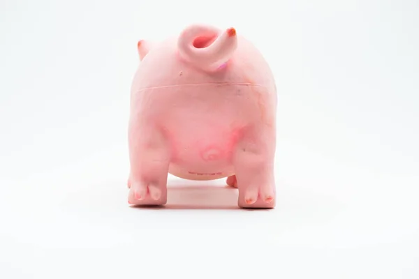 stock image Pink pig plastic figurine toy on a white background. Minimal still life photography