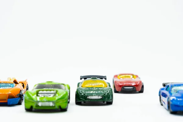Vista Diferentes Brinquedos Carros Corrida Coloridos Fundo Branco — Fotografia de Stock