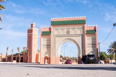 Classical Morocco arch architecture on a sunny blue sky background day.