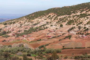 Panoramic view of the Atlas Mountains in Morocco and its curved roads to cross them