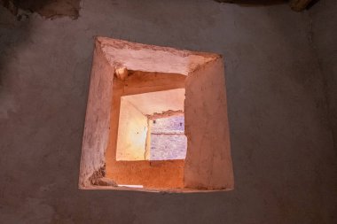 An old kasbah that served as a base for nomadic tribes, with a sense of ruggedness and adventure.