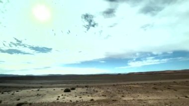 Panorama of the desert and typical towns on the way through the Atlas Mountains to arrive in the Sahara in Morocco