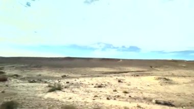 Panorama of the desert and typical towns on the way through the Atlas Mountains to arrive in the Sahara in Morocco