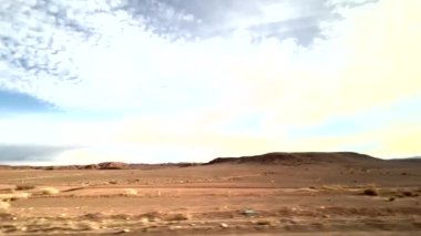 Panorama of the desert and typical towns on the way through the Atlas Mountains to arrive in the Sahara in Morocco