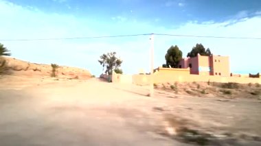 Panorama of the desert and typical towns on the way through the Atlas Mountains to arrive in the Sahara in Morocco