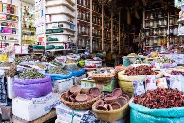 spice shop and typical products in the souk of Jemaa el-Fnaa square in Marrakesh in Morocco