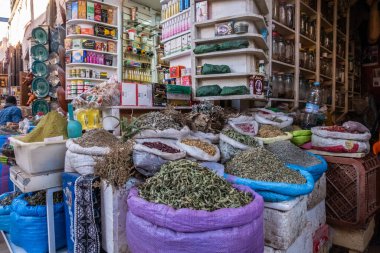 spice shop and typical products in the souk of Jemaa el-Fnaa square in Marrakesh in Morocco