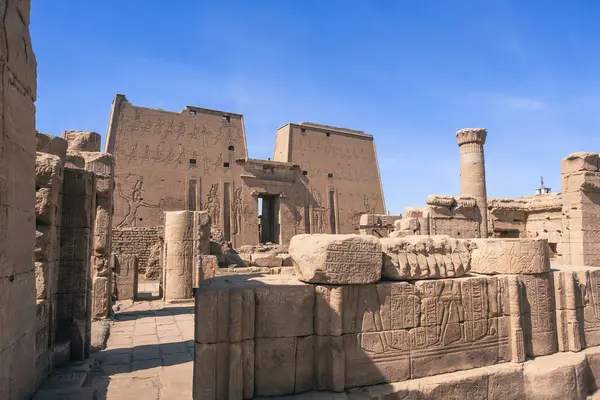 Experience the wonder as tourists wander through the halls of an ancient Egyptian temple. Great for travel and tourism content. Experience Egypts summer allure through captivating images of the