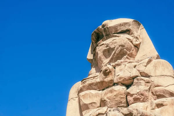 stock image Behold the awe-inspiring Colossi of Memnon as they stand proudly in the soft morning light. These colossal twin statues of Pharaoh Amenhotep III have guarded the Theban Necropolis for over 3,400 years