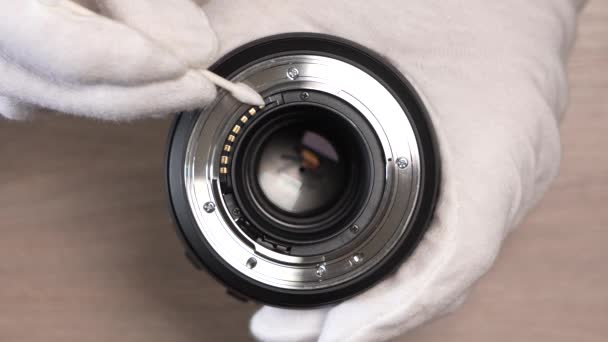 Cleaning Electrical Contacts Modern Lens Using Cotton Tips Top View — Stock Video