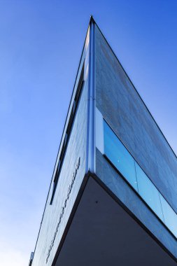 Lugano, Switzerland - January 14. 2022: Exterior of the modern architecture of LAC (Lugano Arte e Cultura) cultural center in the Italian-speaking Lugano, Ticino.