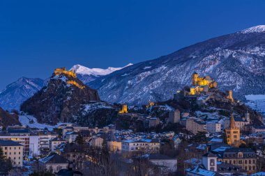 The twin Swiss castles of Valere Basilica and Tourbillon in Sion - the canton of Valais, Switzerland clipart