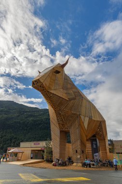 Mollis, Switzerland - August 29. 2025: The big wooden cow (21 meter hight)  at the Swiss Wrestling and Alpine Festival, which is the most traditional national sport festival held every three year in Switzerland