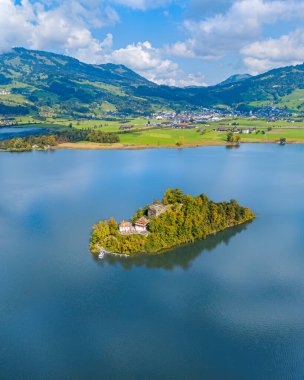 Aerial image of the Schwanau Island with ruins of a medieval castle on the Lauerzer Lake in Canton Schwyz.