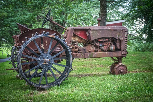 stock image A look at an old rusted tractor in a park in Havre De Grace Maryland.