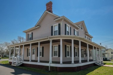 ENGLISHTOWN, NEW JERSEY- APRIL 14- A classic home with full wrap around porch on April 14, 2018 in historic Englishtown New Jersey.
