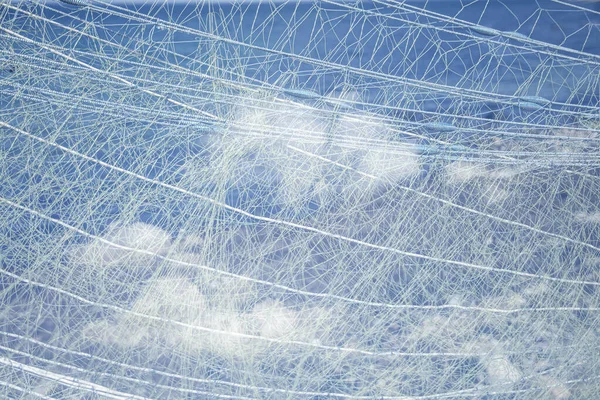 Creatieve Close Van Visnet Aganst Blauwe Lucht Met Wolken — Stockfoto