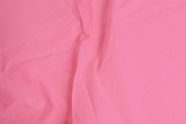 Arkaplanı kopya alanı olan pürüzsüz pembe sayfa