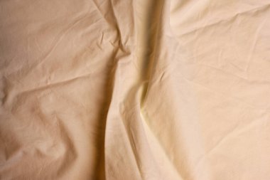 Açık turuncu, zarif yumuşak kumaş.