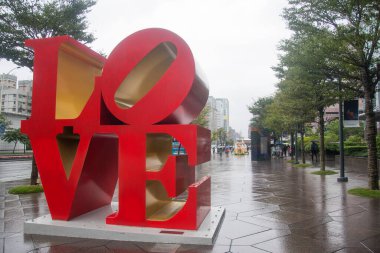 Taipei, Taiwan- 10 Dec, 2022: Famous love sign outside the Taipei 101 building where many couples go to take a photo next to the sign on May 31 2017 in Taipei