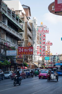 Bangkok, Thailand- 13 Feb, 2023: Busy traffic on the Yaowarat road. Yaowarat is a famous street food market in Chinatown, Bangkok.