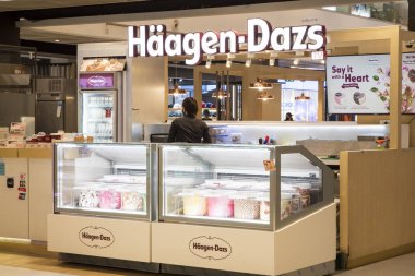 Bangkok, Thailand- 15 Feb, 2023: Haagen Dazs logo in front of their local shop and restaurant in Bangkok. Haagen Dazs is an american ice cream manufacturer and seller