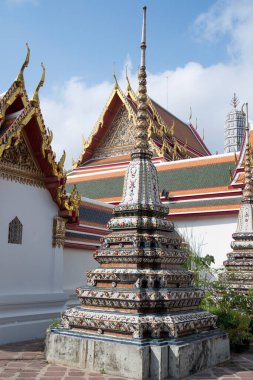 Beautiful chedi in the Wat Pho, Bangkok. It is one of the oldest and largest temples in Bangkok features the famous Reclining Buddha