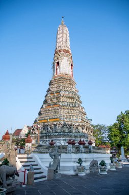 Bangkok, Thailand- 14 Feb, 2023: Impressive architectural details of Wat Arun (The Temple of Dawn) in Bangkok. This landmark of Wat Arun is a 70-meter-high temple tower, a stupa-like pagoda
