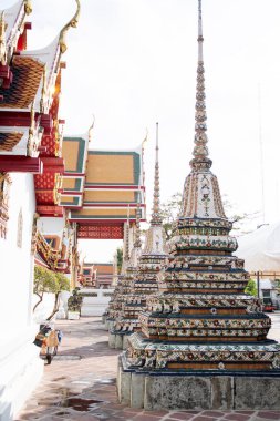 Bangkok, Thailand- 13 Feb, 2023: Beautiful chedi in the Wat Pho, Bangkok. It is one of the oldest and largest temples in Bangkok features the famous Reclining Buddha